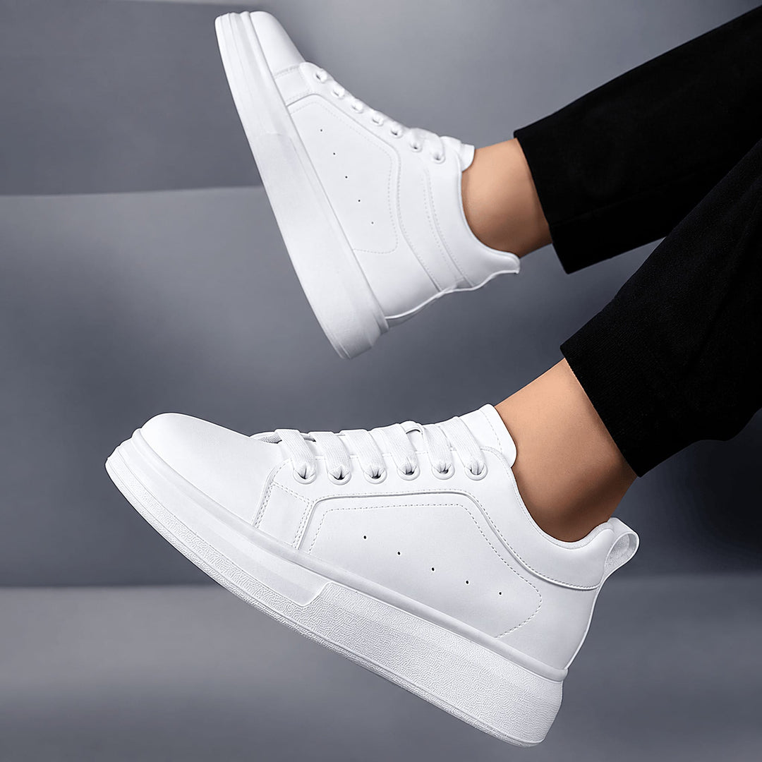 Ratio Lumen white sneakers on feet, side profile showing the platform sole